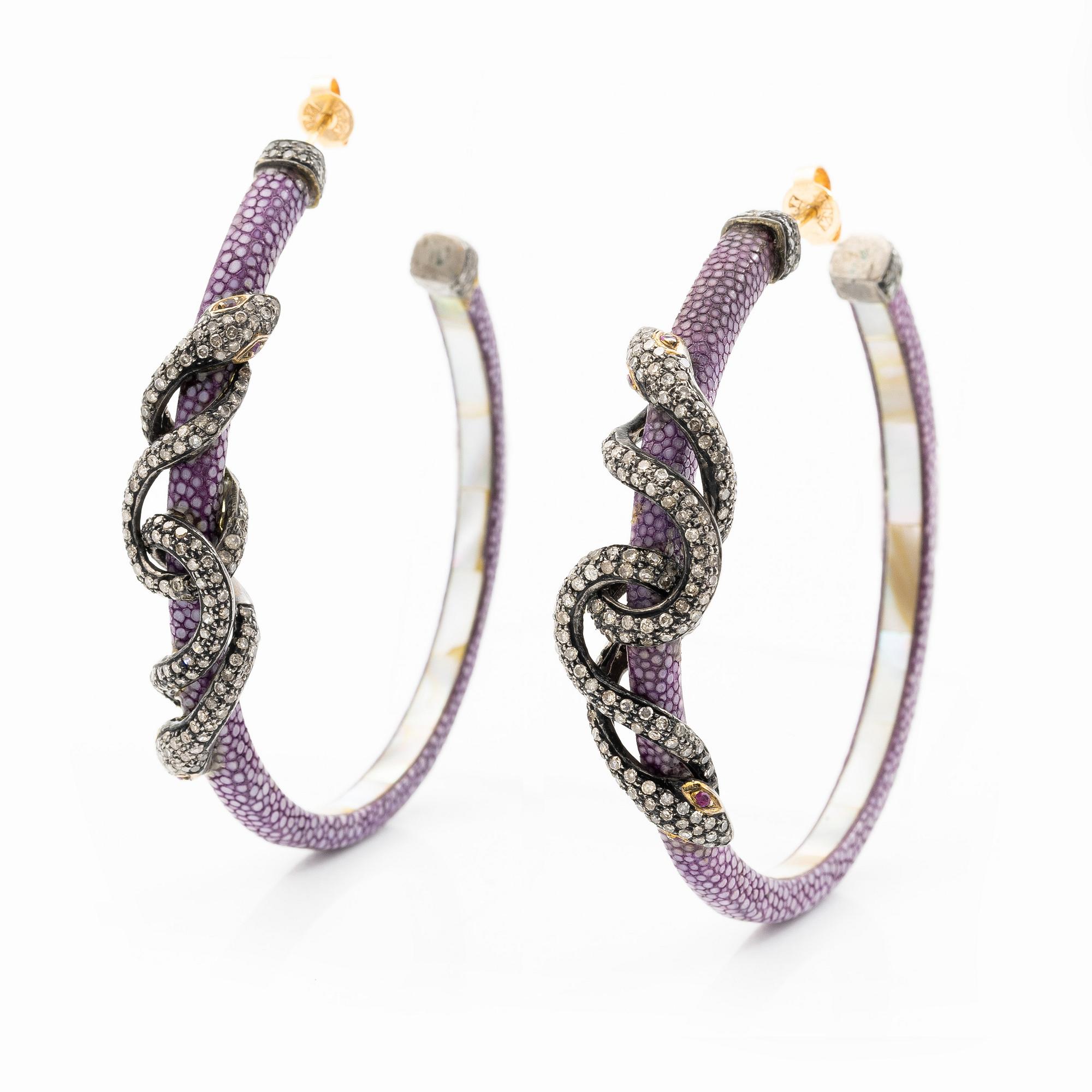A pair of earrings in the shape of a snake, leather, mother-of-pearl and silver, with  diamonds in various cuts.