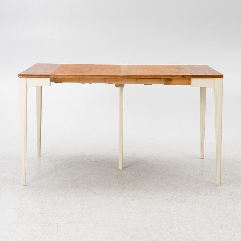A dining table, mid-20th century.