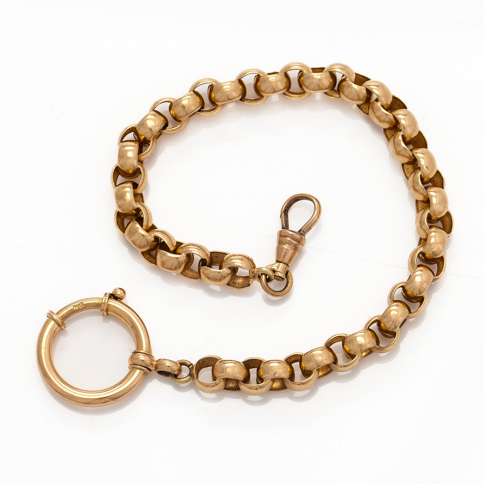 Kellovitja, 18K kultaa.