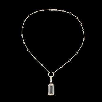 698. A Wiwen Nilsson sterling and rock crystal pendant with chain, Lund 1947.