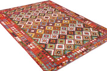 A Kilim carpet, c. 344 x 255 cm.