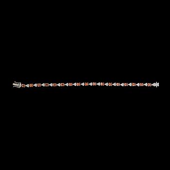 28. BRACELET, brilliant cut diamonds, tot. app. 1.40 cts and orange sapphiresm tot. app. 6 cts.