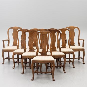 Dining table, 8 chairs, 2 armchairs, sideboard, Rococo style, early 20th century.