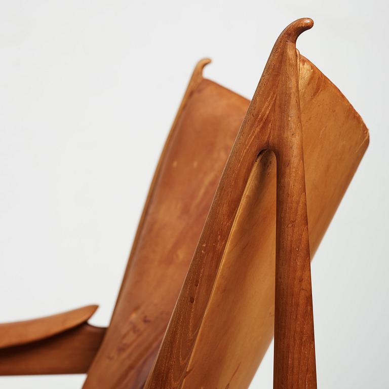 Finn Juhl, a teak and natural brown leather "Chieftain Chair" by Niels Vodder, 1950-60's.