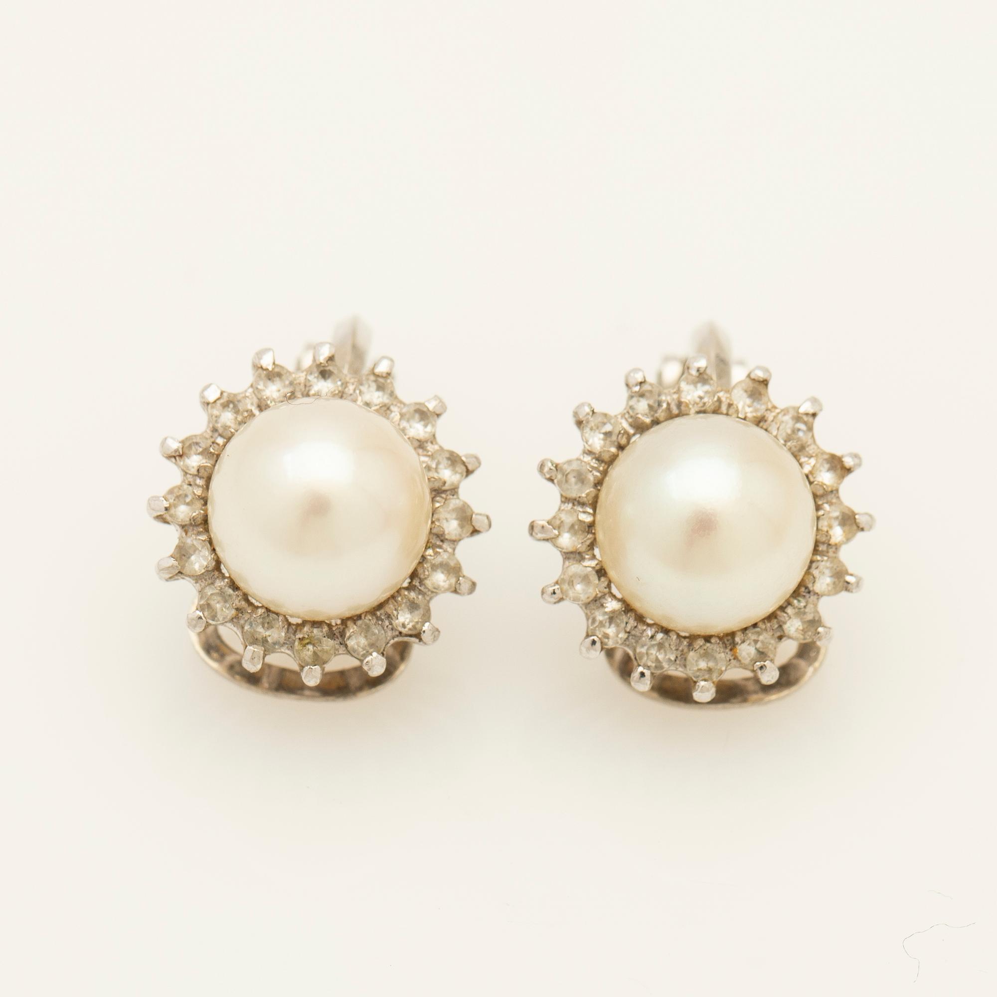 Earrings, a pair, 18K white gold with pearls and diamonds.