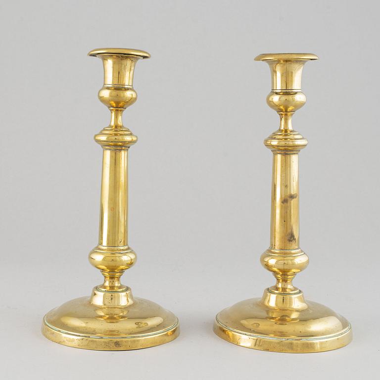 A pair of bronze Rmpire candlesticks, first half of he 19th century.