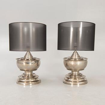 A pair of Eichholtz "Pagoda" 21st century metall table lamps.