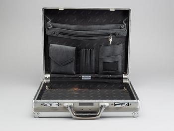 A set of three Rimowa bags later part of the 20th century.