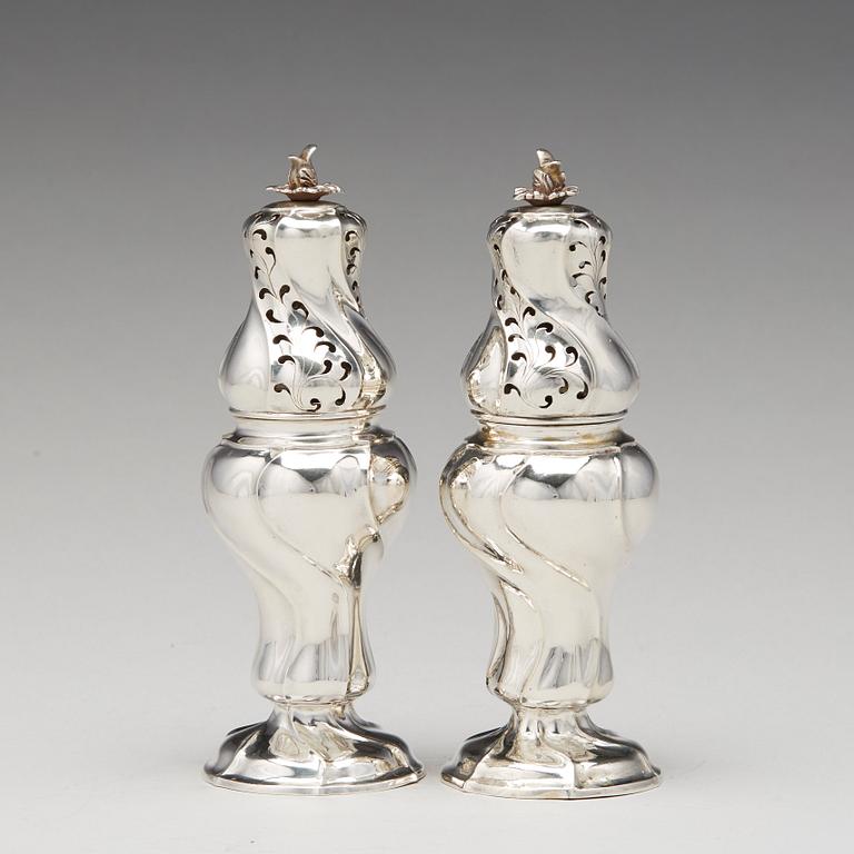 A matched pair of Swedish Rokoko silver sugar-casters, one marked Olof Gravander, Kristinehamn 1764, one a later copie.