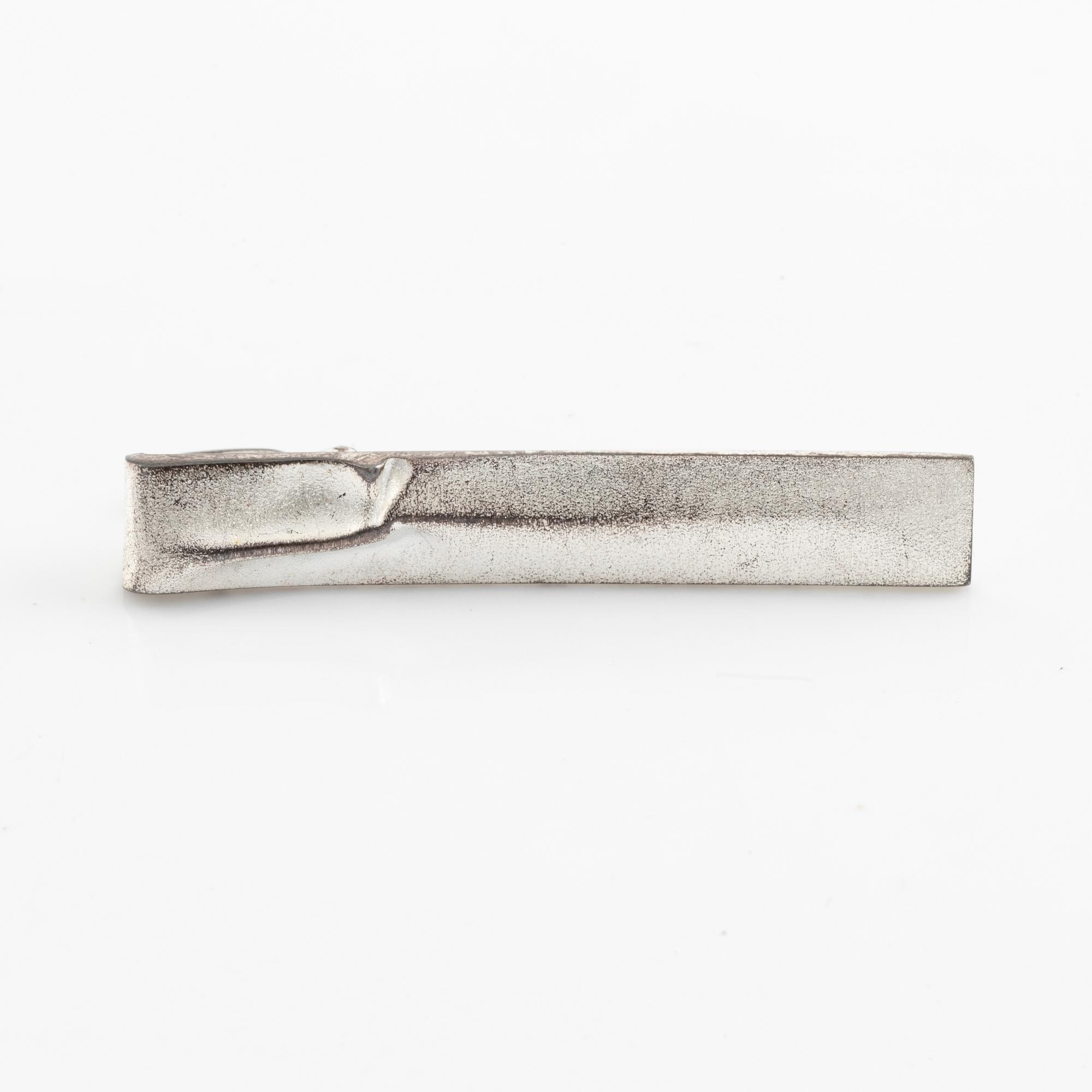 Lapponia, two sterling silver rings and tie ping.