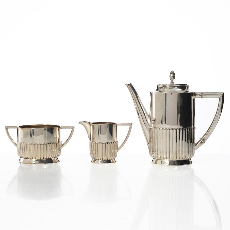 Guldsmedsaktiebolaget (GAB), A Swedish silver coffee pot, cream jug and sugar bowl, mark of GAB, Stockholm 1918-1919.