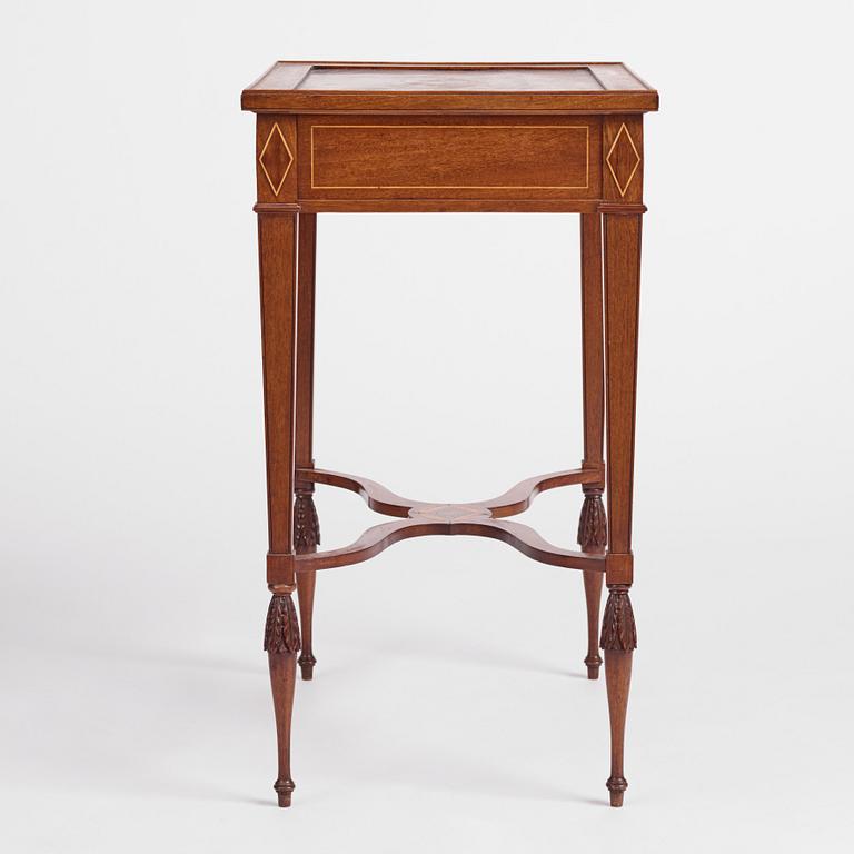 A late Gustavian mahogany table attributed to L. Qvarnberg (master in Stockholm 1801-1813).