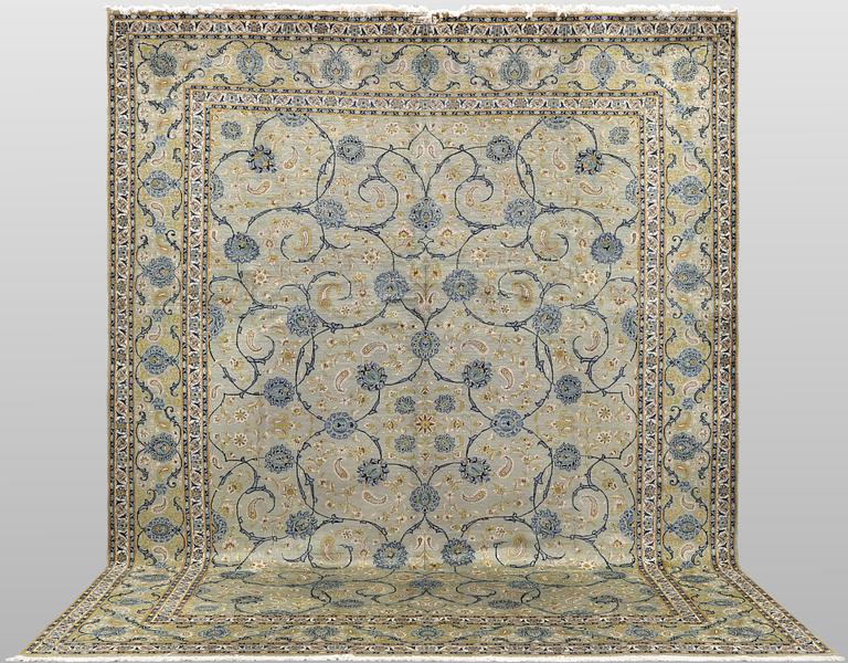 A Royal Keshan carpet, signed, 410 x 307 cm.