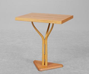 A Carl- Axel Acking oregon pine table by Nordiska Kompaniet for the Hotel Malmen ca 1949-51.