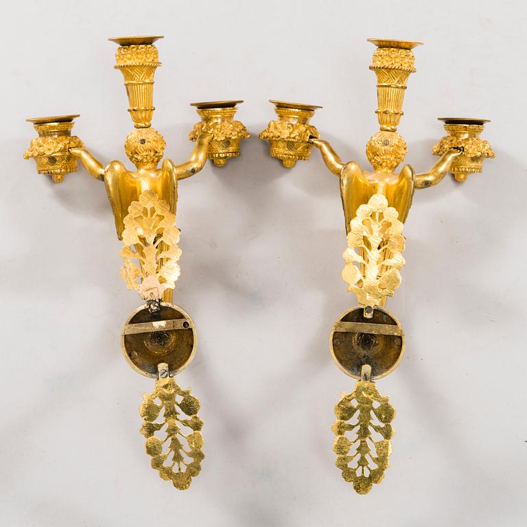 A PAIR OF WALL CANDELABRAS, France, empire first half of the 19th century, ormolu.