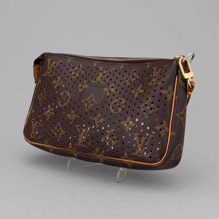 A Louis Vuitton hand bag.