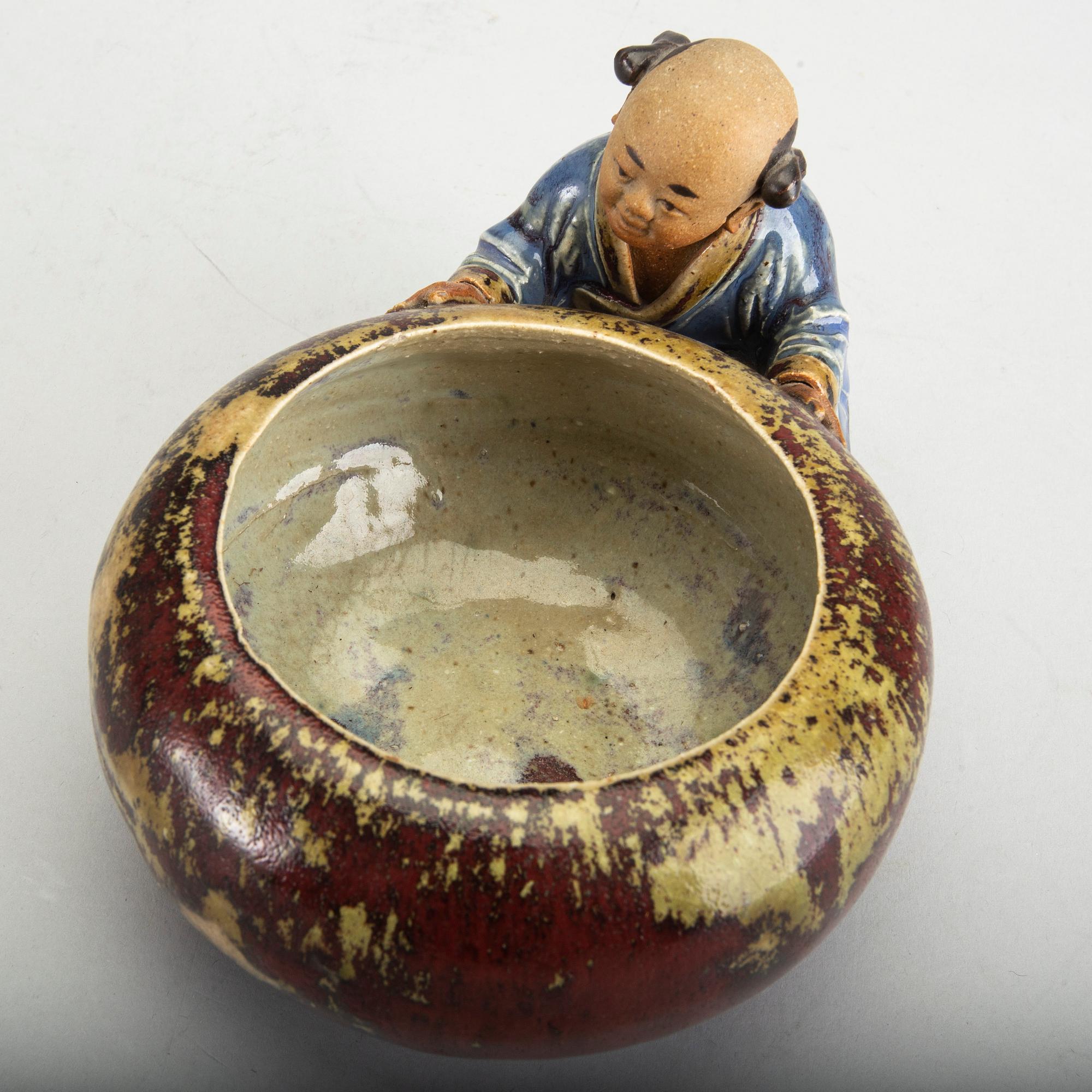 A Japanese 20th century signed porcelain figurine.