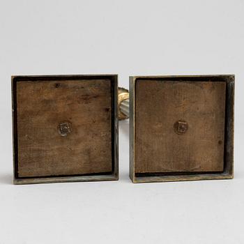 A pair of bronze gustavian candlesticks, late 18th century.