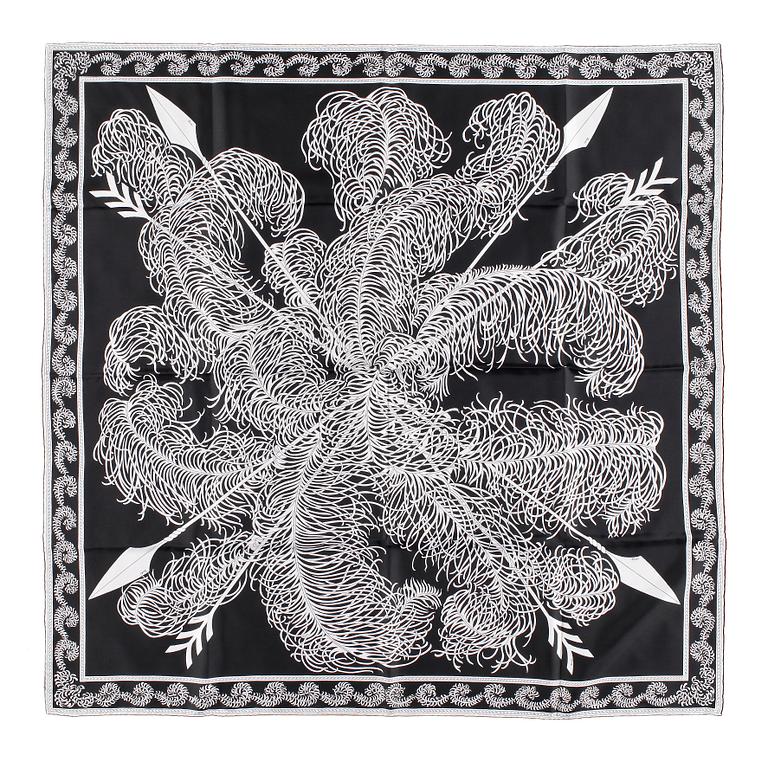 A set of three scarves by Christian Dior, Emilio Pucci and Yves Saint Laurent.