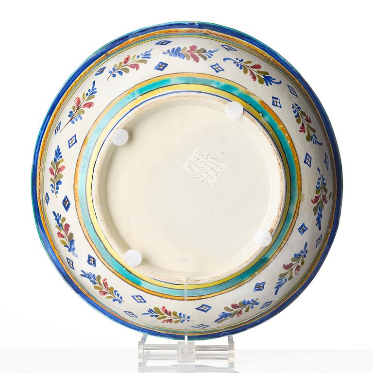 A polychrome faiance dish, probably 18th century.
