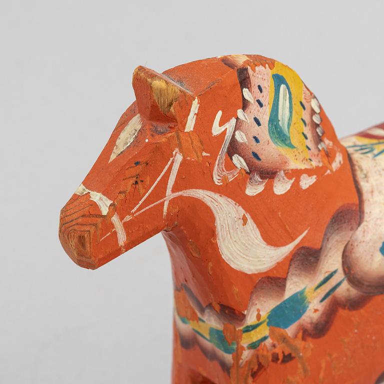 A set of painted wooden horses and roosters from Dalarna, Sweden, mid 20th century and late 20th century.