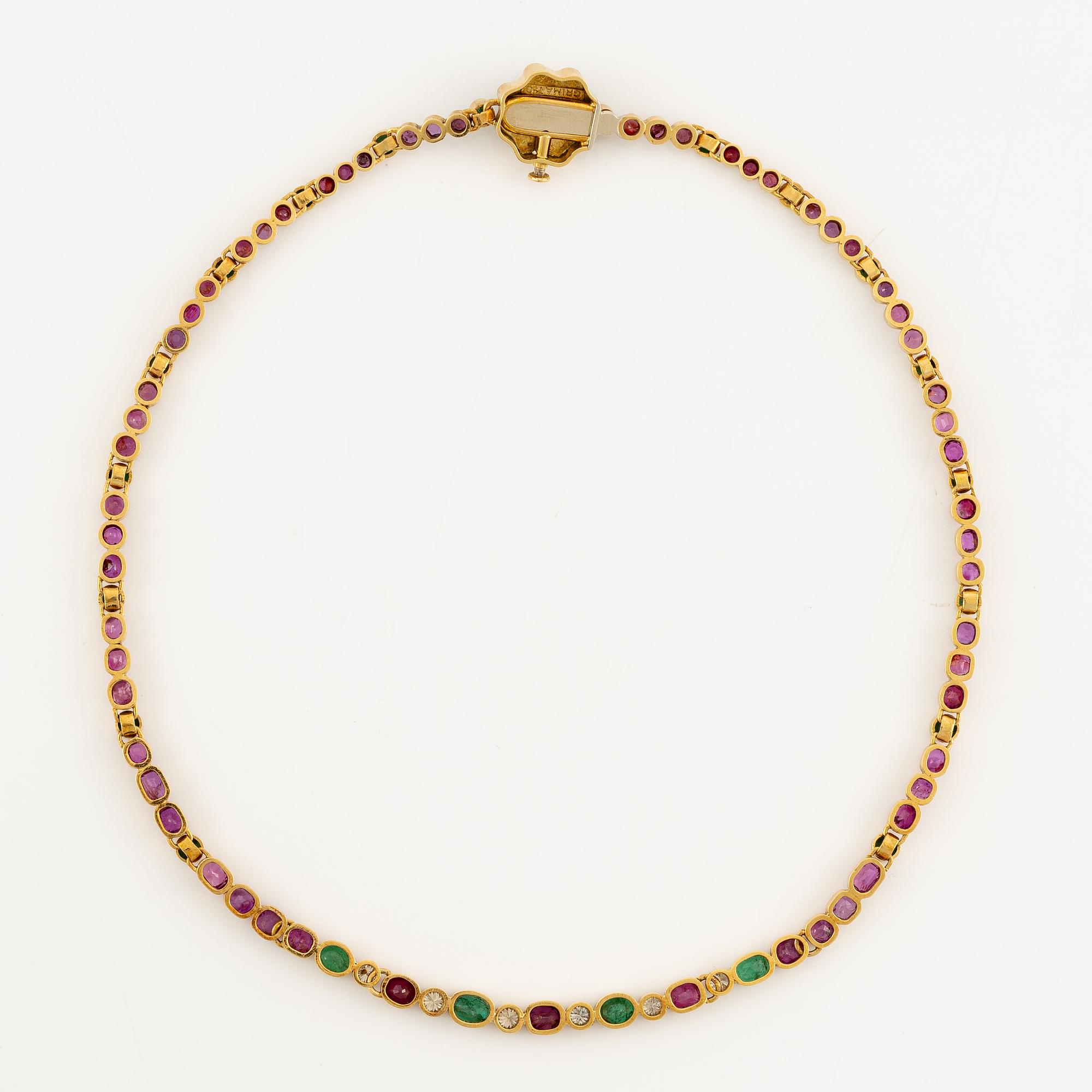 Andrew Grima, collier 18K guld med runda briljantslipade diamanter samt rubiner och smaragder.