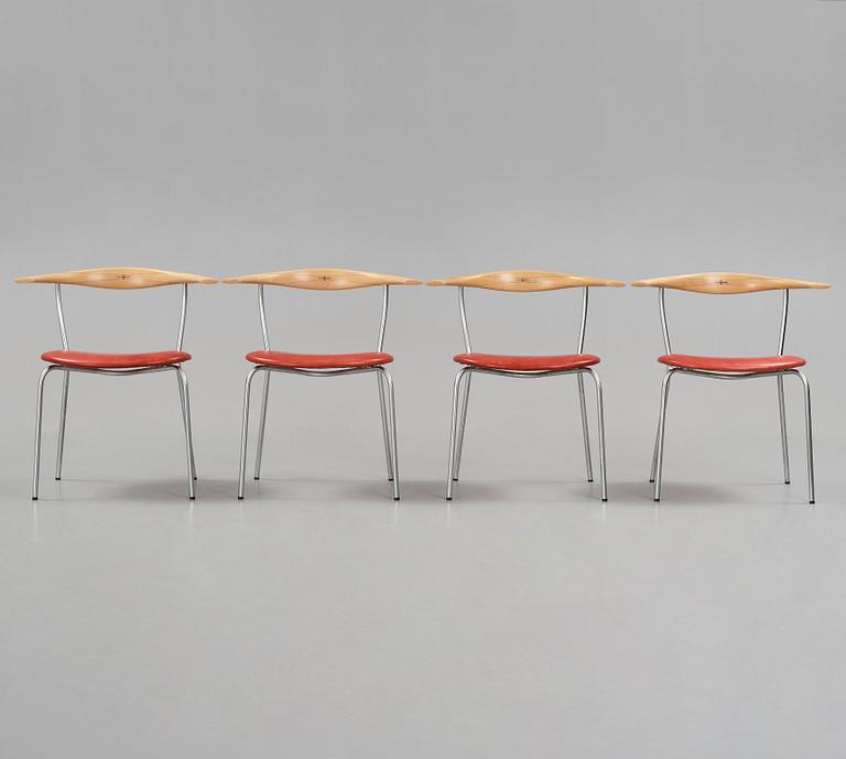 Hans J. Wegner, a set of four 'JH 701' dining chairs, executed by Johannes Hansen, Denmark.