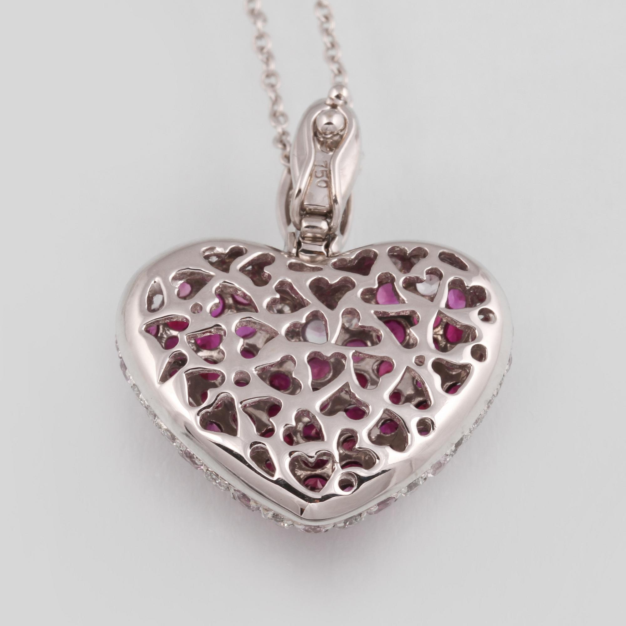 HÄNGE, 18K vitguld med fasettslipade diamanter ca 0.60 ct, rubiner ca 2.31 ct samt rosa safirer ca 0.68 ct. Vikt 7,8 g.