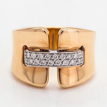 An 18K gold ring, brilliant-cut diamonds totalling approximately 0.20 ct. Italy.