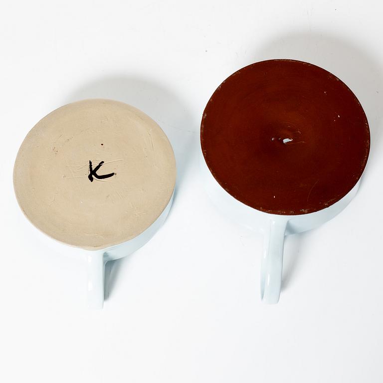 Kennet Williamsson, a set of eight ceramic pieces, signed.