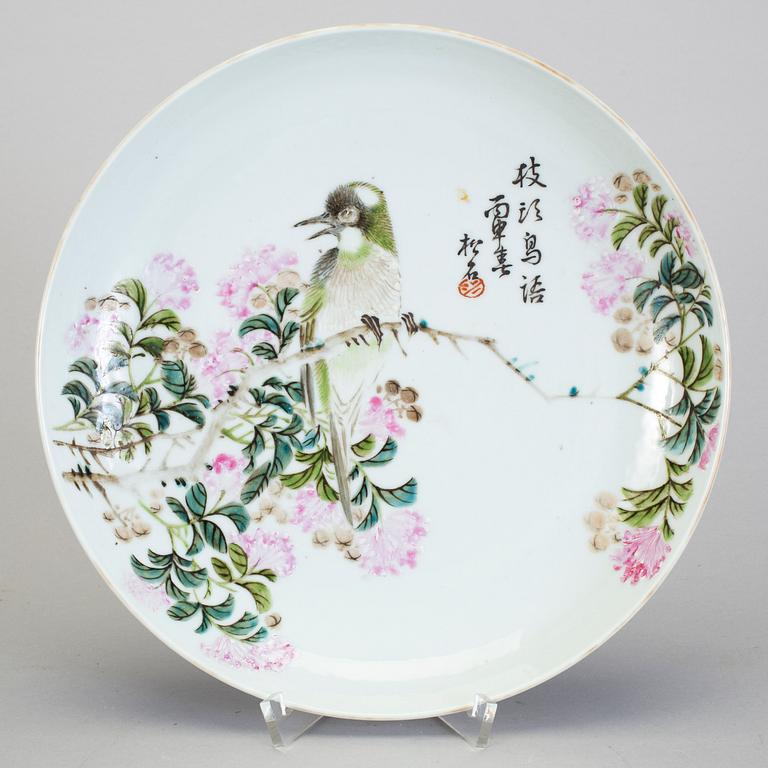 A famille rose dish depicting a bird and poem, 20th century.