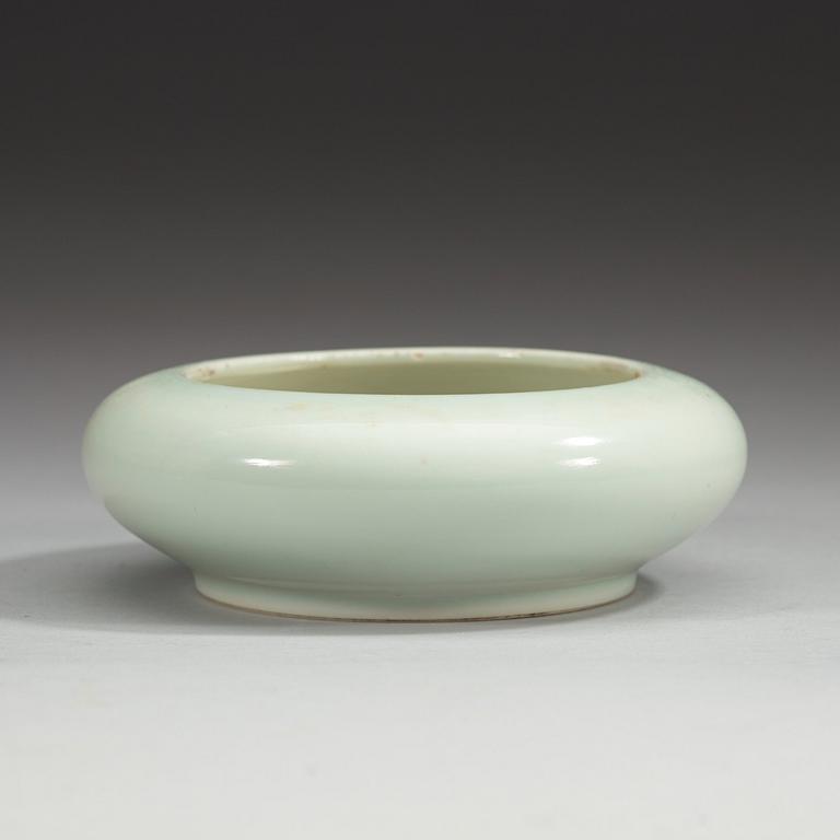 A pale celadon glazed brush washer, Qing dynasty (1644-1912), with Kangxi six character mark.