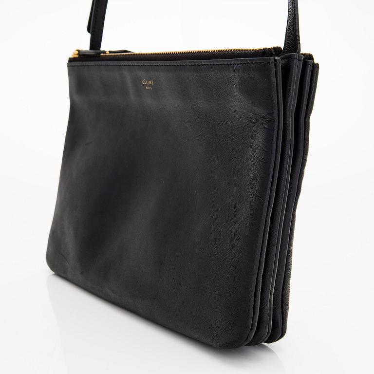 Céline, a black leather 'Trio' bag.