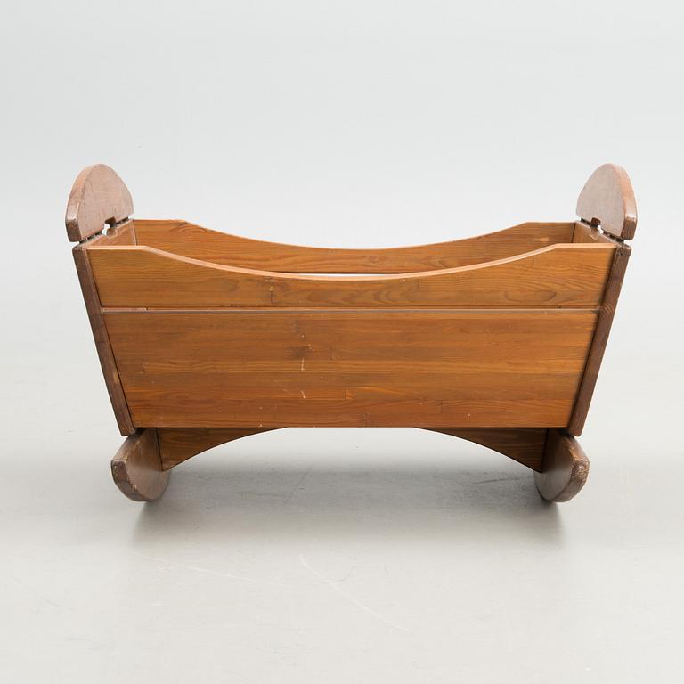 An early 1960s cradle 'Apu' manufacturer Laukaan Puu, Finland for Apu magazine.