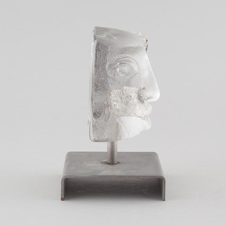 a glass object, signed.