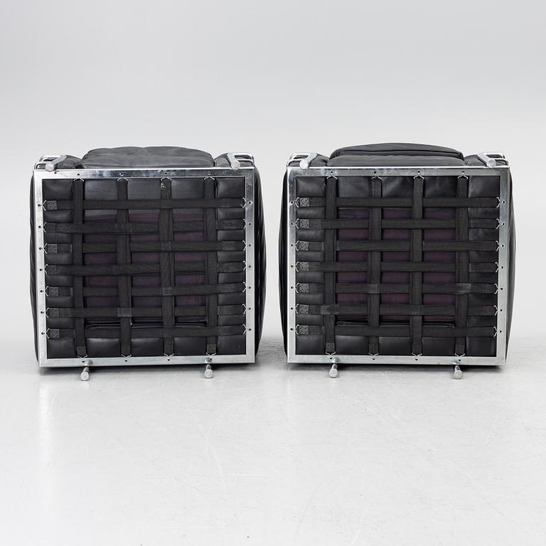 a pair of "LC2" armchairs, Cassina, second half of the 20th century.