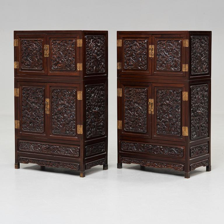 A pair of Chinese hardwood cupboards, late Qing dynasty (1644-1912).