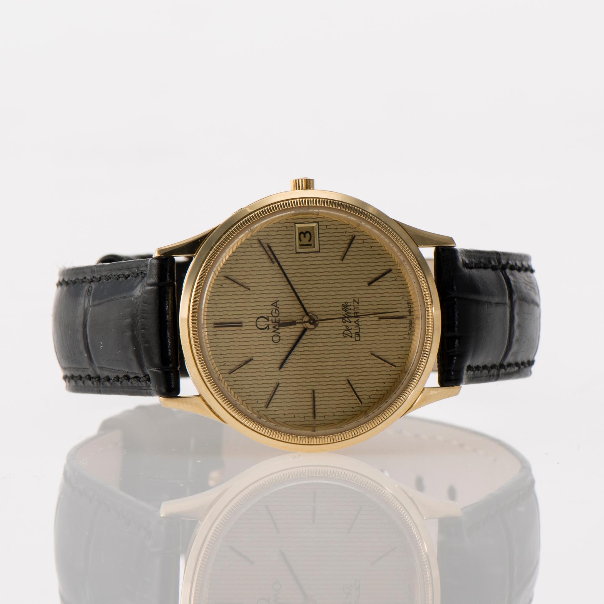 ARMBANDSUR, herr, Omega De Ville. 18K guld, läderrem. Original etuí.