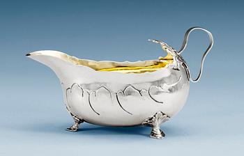 820. A SWEDISH PARCEL-GILT CREAM JUG, Makers mark of Lars Boye, Stockholm 1769.