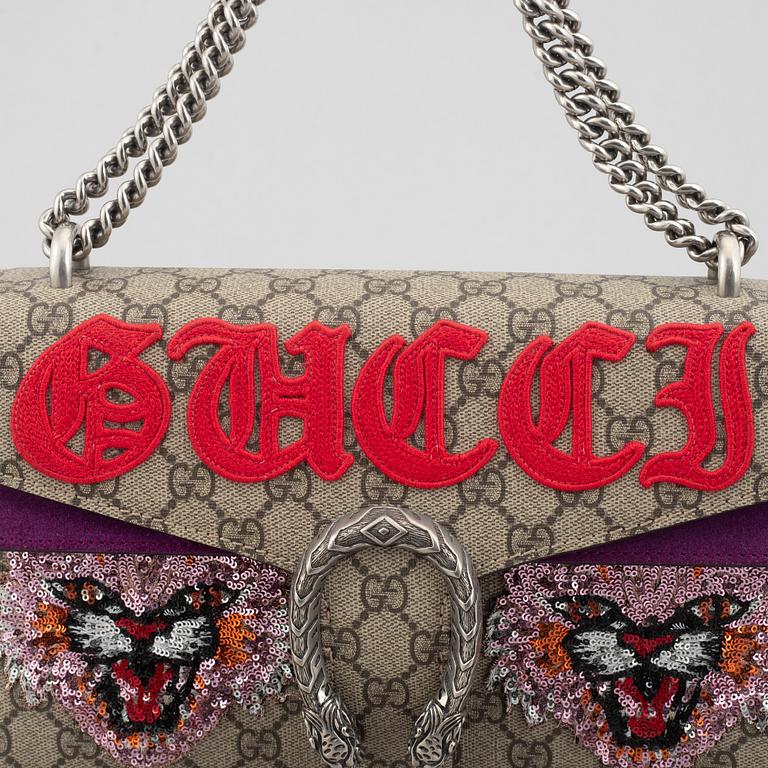 Gucci, a 'Dionysus' handbag.