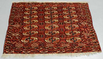 A rug, Antique Tekke, ca 115 x 115 cm.