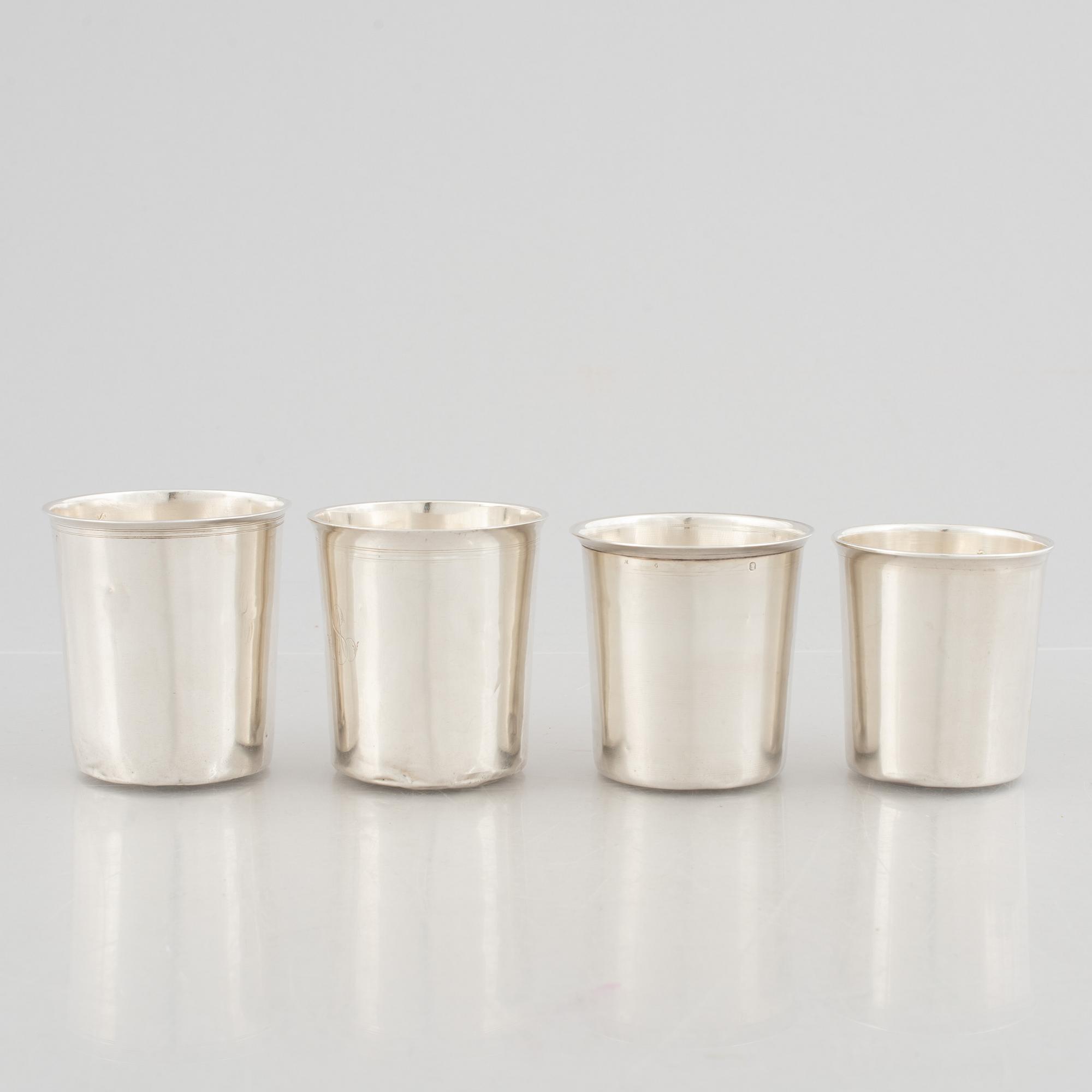 Four French silver beakers, Paris, 19th Century.