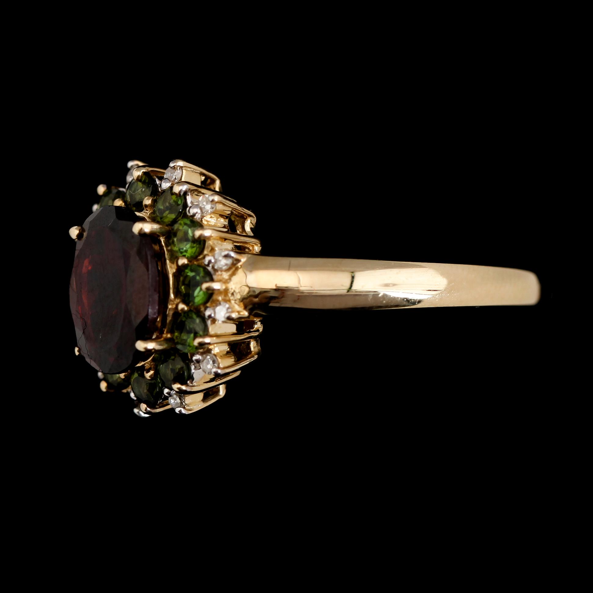 RING, 10K guld, diamanter tot ca 0.06 ct, granater och turmaliner.