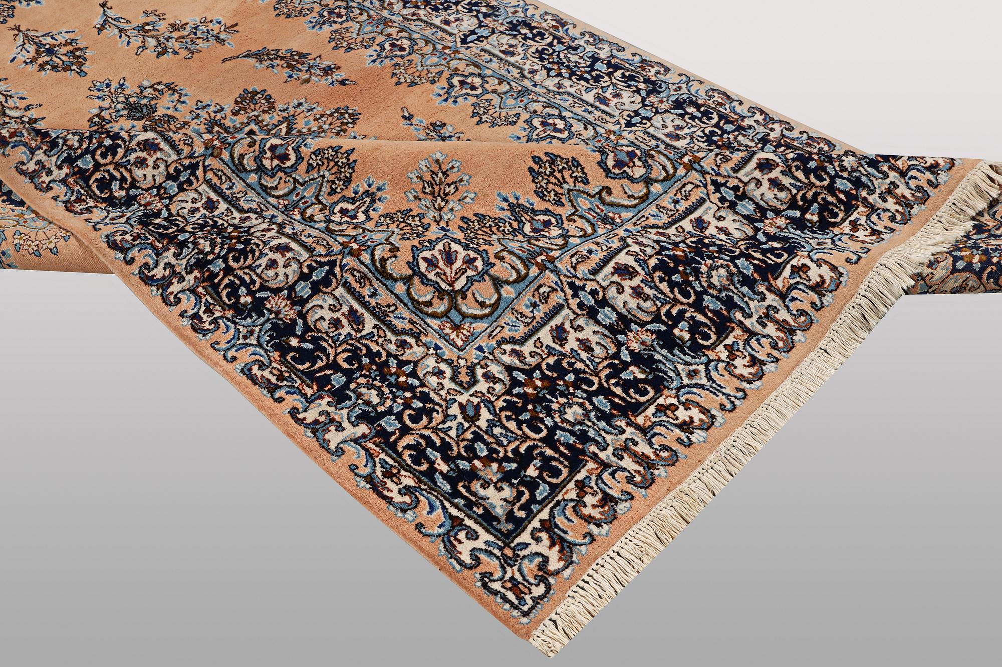 A carpet, Kerman, ca 352 x 188 cm.