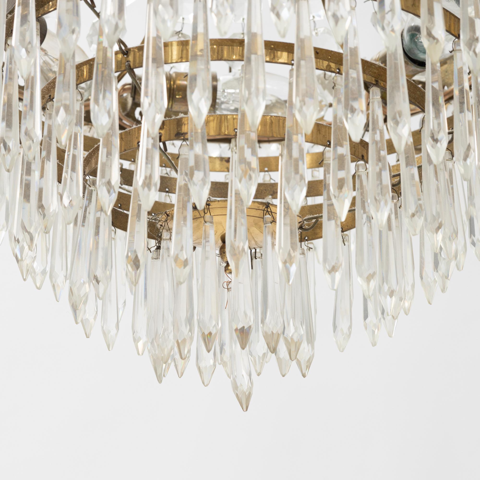 An Empire style chandelier, later part of the 20th Century.