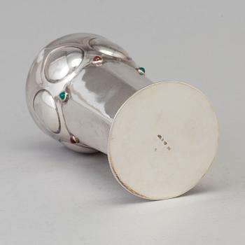 A Swedish Art Nouveau parcel-g beaker decorated with carneols and garnets, maker's mark Julia Anderson, Stockholm, 1909.