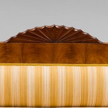 A mahogany sofa dated 1840.