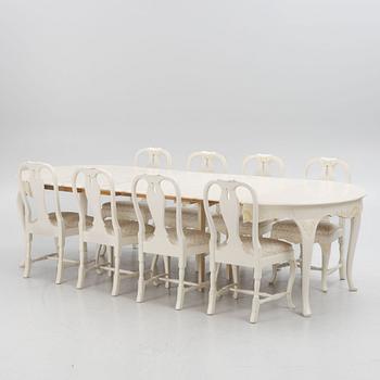 A Rococo style dining table with eight chairs, second half of the 20th century.
