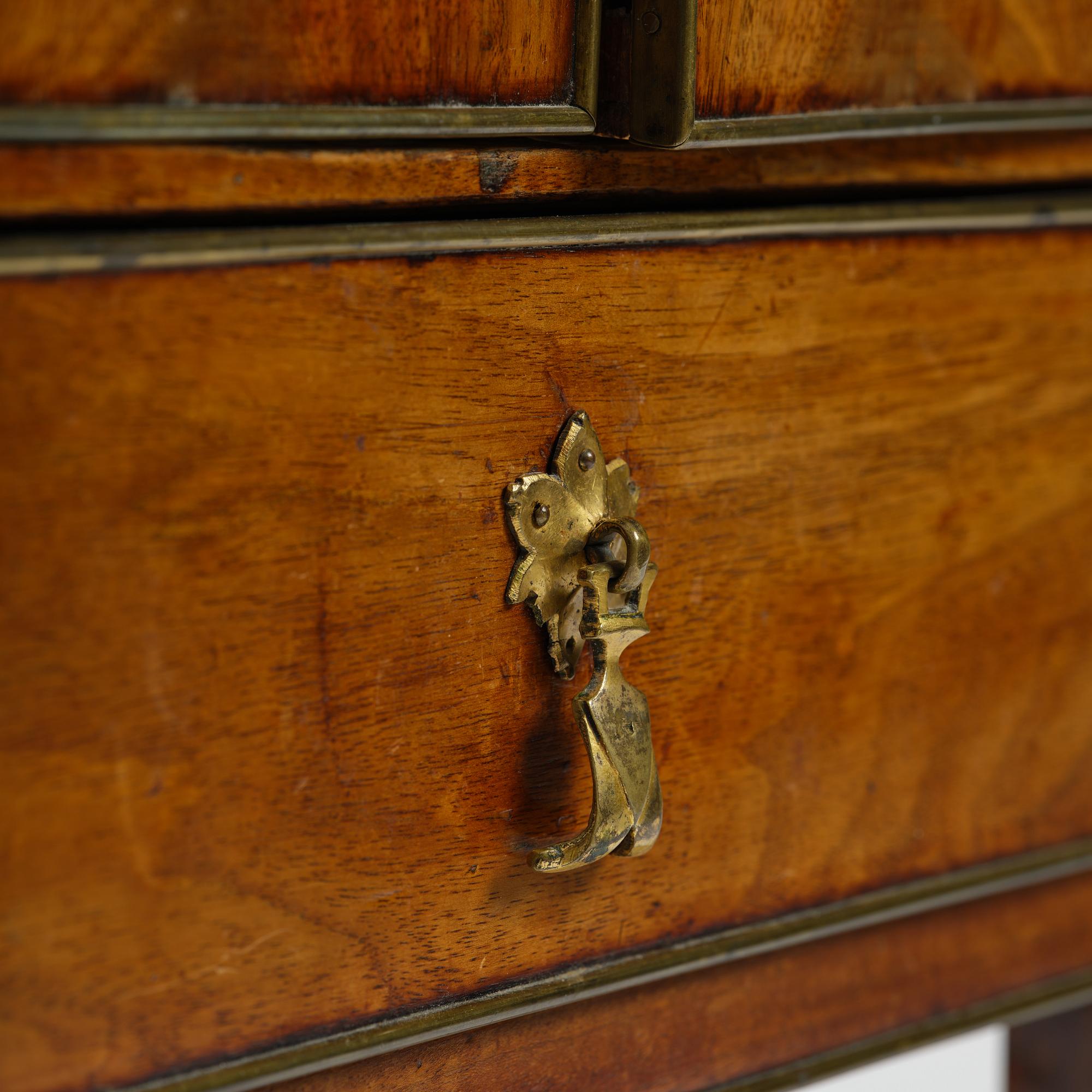 A late Gustavian mahogany chamberpot cupboard, circa 1800.