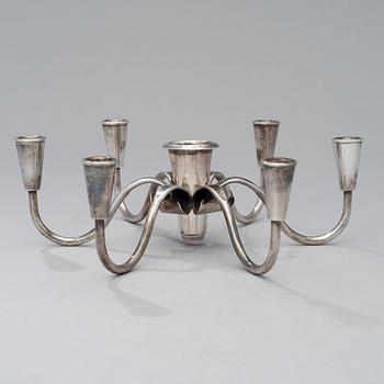 A pair of silver plated candelabra and a candelabrum, FDG, Denmark, mid 20th century.